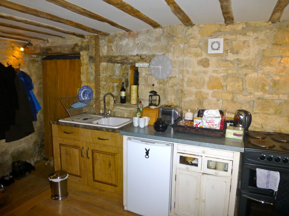 The kitchen in a Cotswolds barn, Popfoster's barn