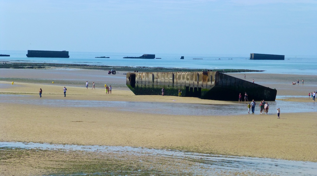 The ruins of World War II Mulberry Harbour at Arromanches, Normandy