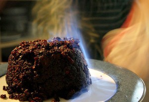 A Christmas pudding flamed with brandy