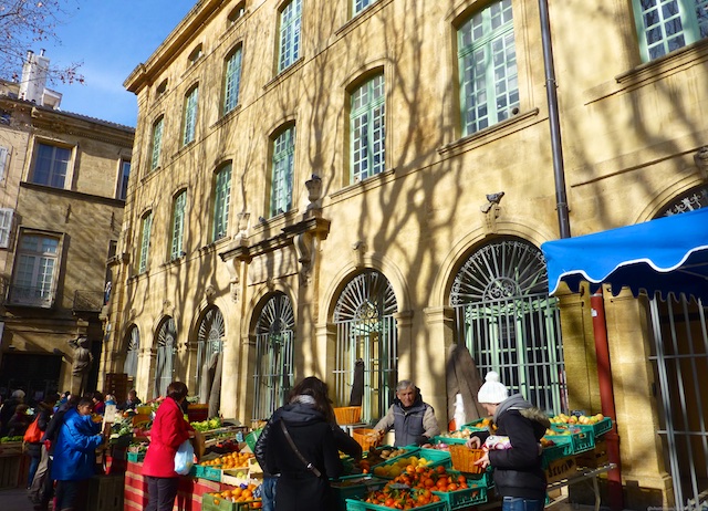 Market stalls by the Stately buildings of Aix-en-Provence