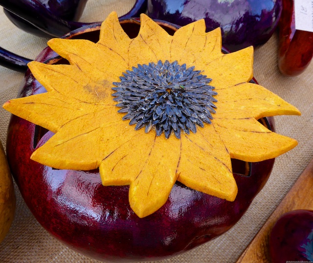 Painted sunflower gourds at a Michigan Art Festival