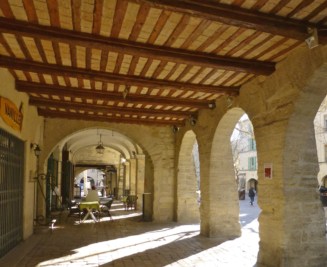 Arches of Place aux Herbes in Uzes