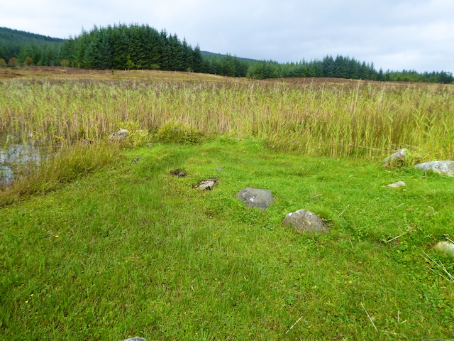 Remains of stone jetty leading to Finlaggan, Islay, Scotland