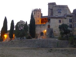 The Lourmarin chateau at dusk in autumn, Luberon, Vaucluse, Provence, France