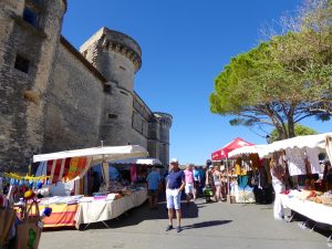 The Gordes market by the chateau in Gordes, Luberon, Provence, France