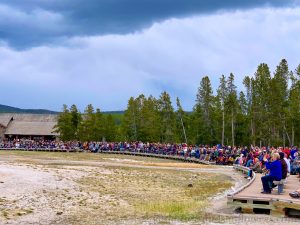 Crowds watching Old Faithful Geyser, Yellowstone National Park, USA