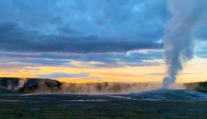 Old Faithful, Upper Basin of Yellowstone at dusk