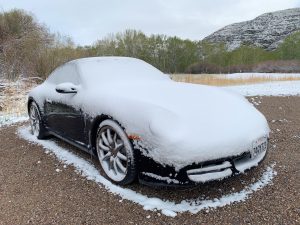 Snow covered car in Montana o our American Road trip