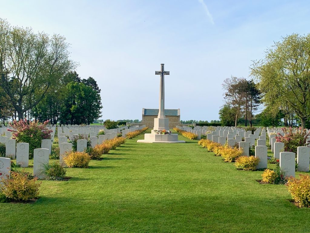 The cross and graves at The Canadian War Memorial at Bény-sur-Mer, Normandy, France