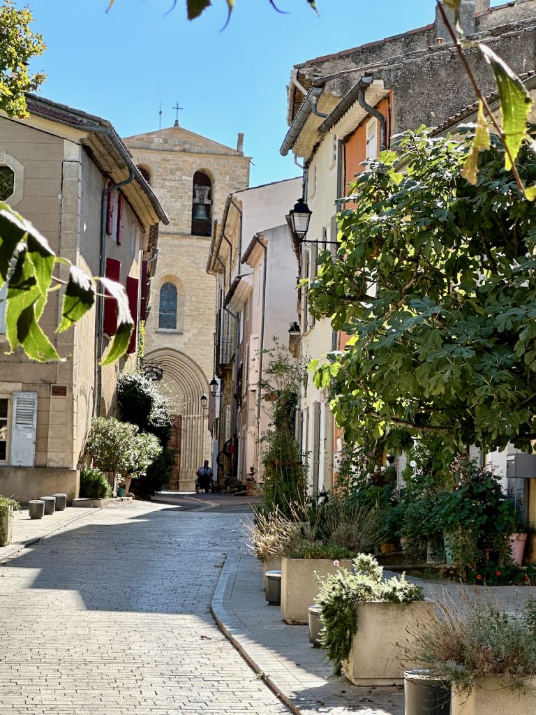 Walking to the church in Cucuron, Luberon, Vaucluse, Provence, France