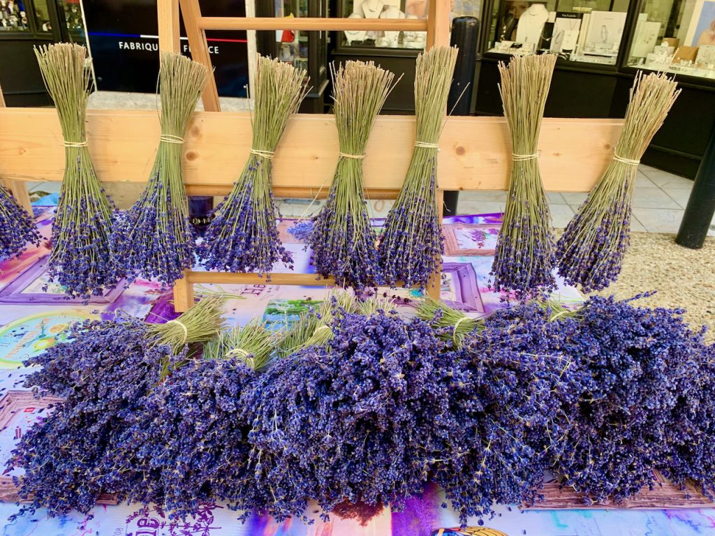 Filling lavender in Lourmarin market, Lourmarin, Luberon, Vaucluse, Provence, France 