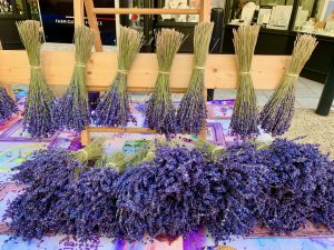 Filling lavender in Lourmarin market, Lourmarin, Luberon, Vaucluse, Provence, France