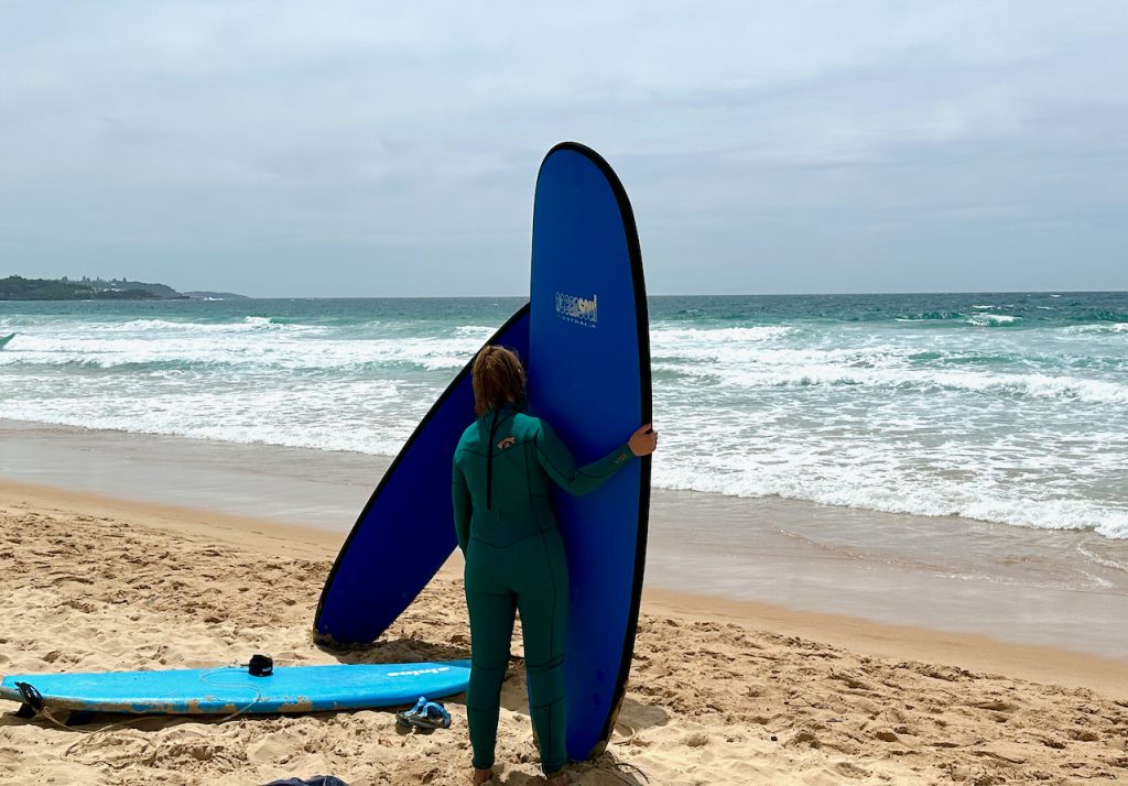 Surfers on Manly Beach, Sydney, NSW, Australia