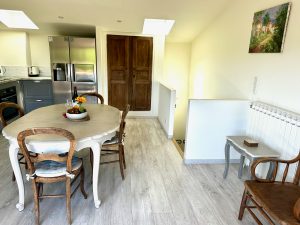 Kitchen showing stairs to living room in our Lourmarin village house for rent