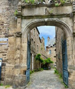 Archway in medieval town of Dinon, Brittany, France